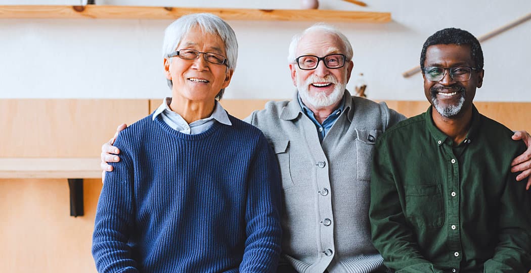 three senior man smiling